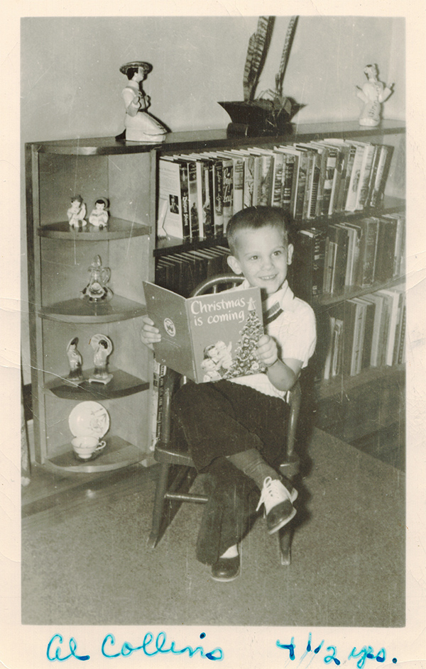 Max Allan Collins Jr., Age 4-and-a-half, seated in a rocking chair and reading a book titled 