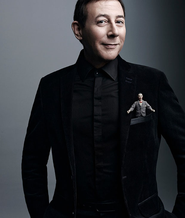 Paul Reubens dressed in black with a Pee-Wee Herman Doll in his breast pocket. Art Streiber / August @aspictures